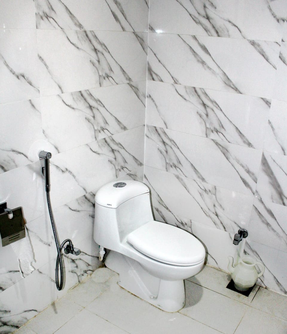 Standard Single Room, 1 Double Bed, Accessible | Bathroom | Shower, bathrobes, slippers, towels