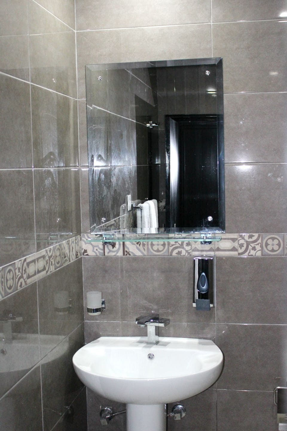 Shower, bathrobes, slippers, towels