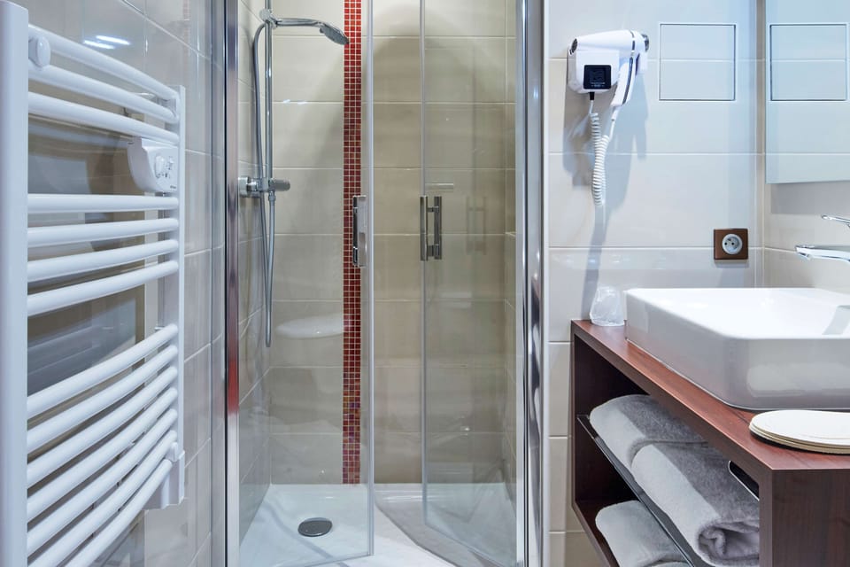 Eco-friendly toiletries, hair dryer, towels