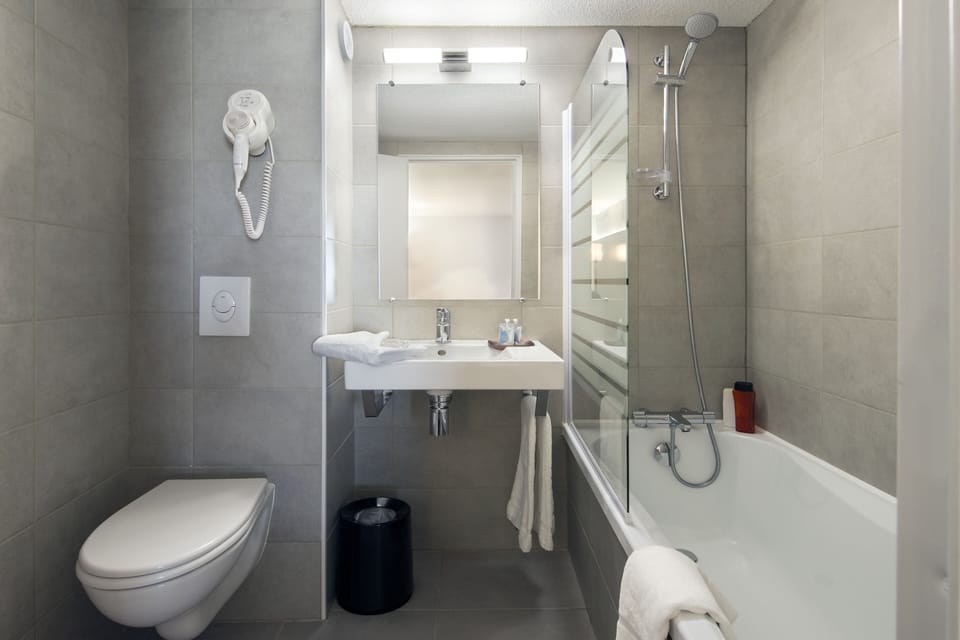 Standard Triple Room, 3 Twin Beds | Bathroom | Free toiletries, hair dryer, towels, soap