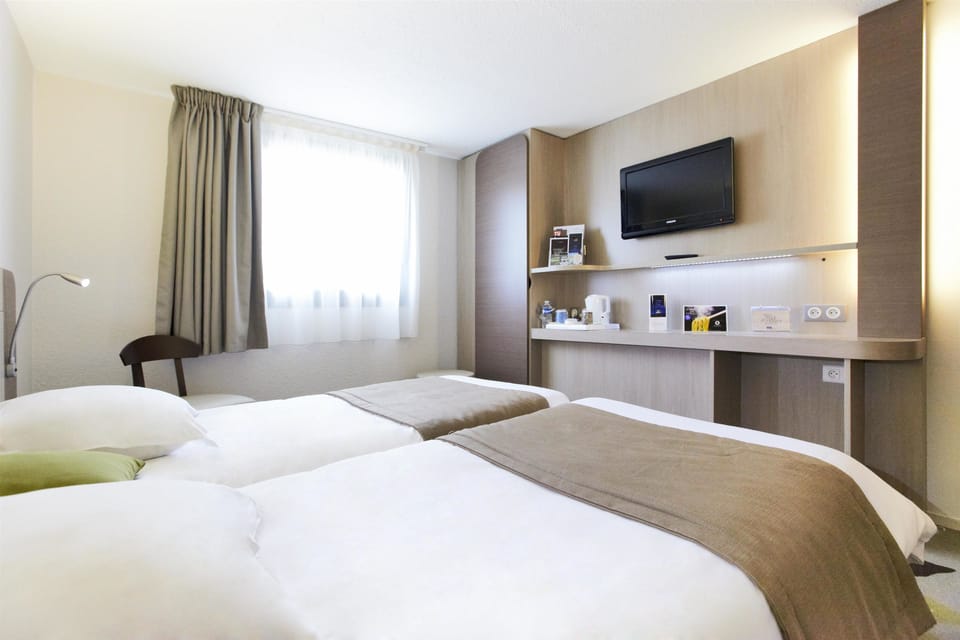 Standard Room, 2 Twin Beds | Individually furnished, desk, blackout drapes, soundproofing