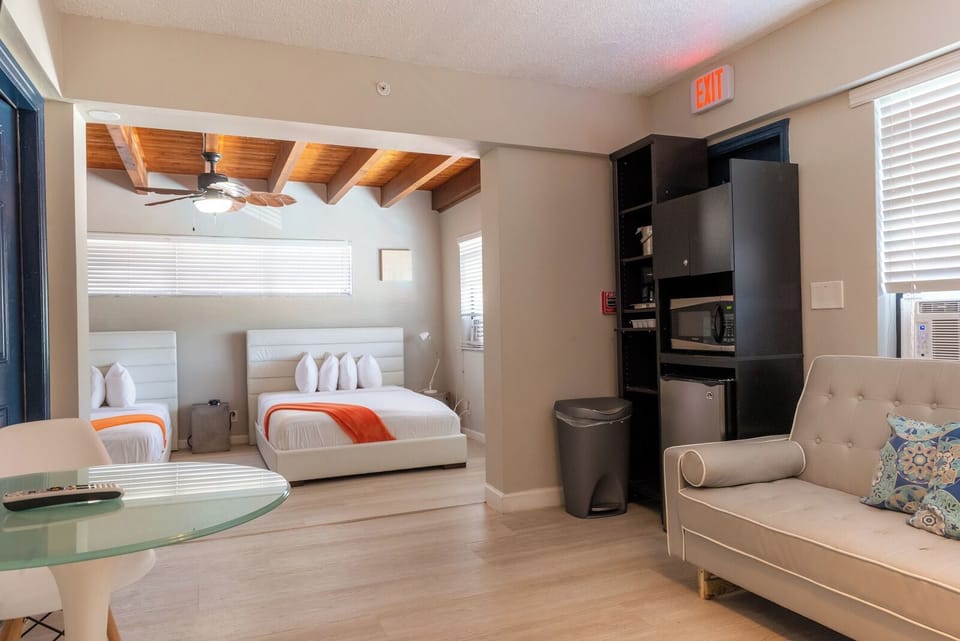 One Bedroom Double Queen Suite | Egyptian cotton sheets, premium bedding, iron/ironing board, free WiFi