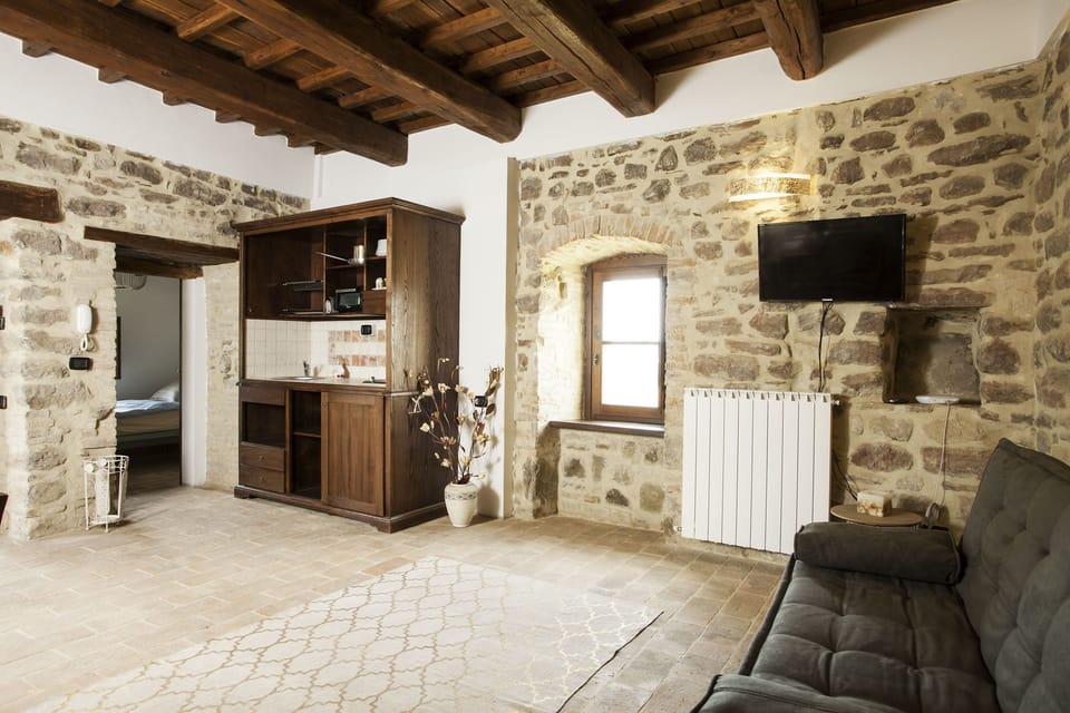 Deluxe Apartment, 2 Bedrooms | Living area | Flat-screen TV
