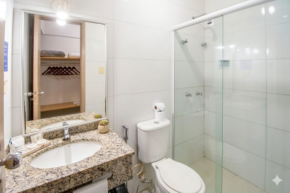 Shower, rainfall showerhead, towels, soap