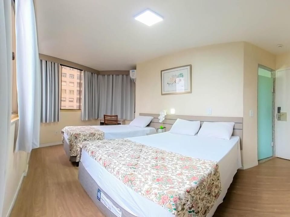 Standard Triple Room, 1 Bedroom | Minibar, desk, blackout drapes, free WiFi