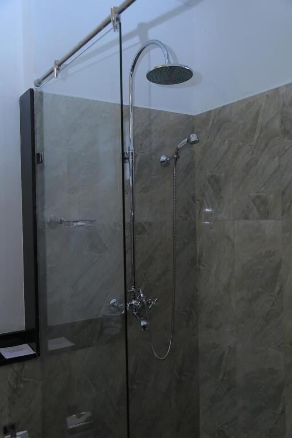 Shower, rainfall showerhead, designer toiletries, hair dryer