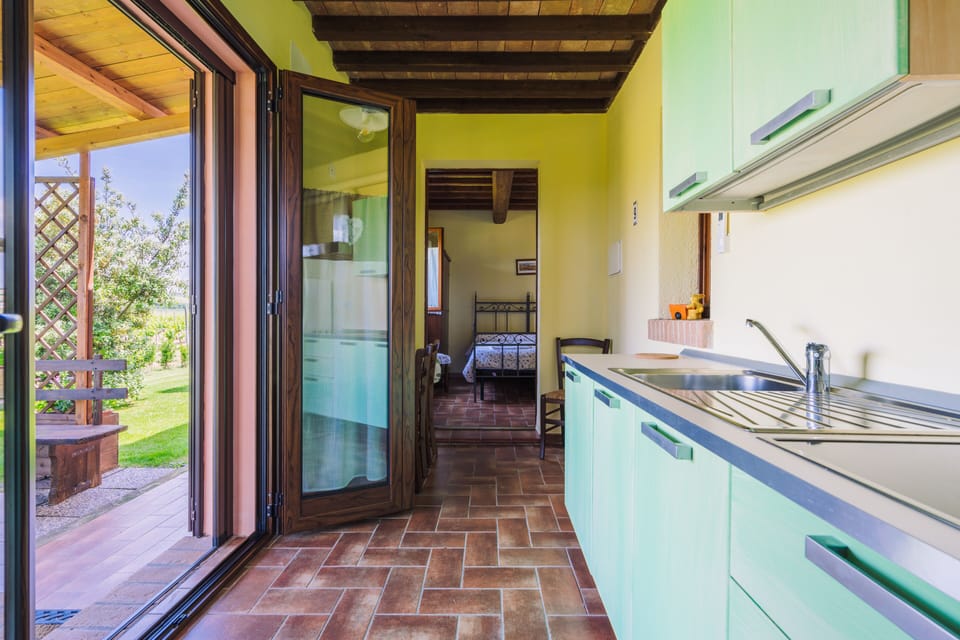Standard Apartment | Private kitchen | Fridge, stovetop, cookware/dishes/utensils, freezer