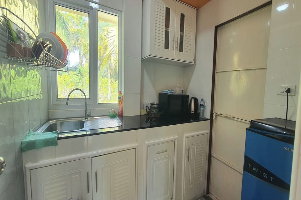 Deluxe Villa | Private kitchen | Fridge
