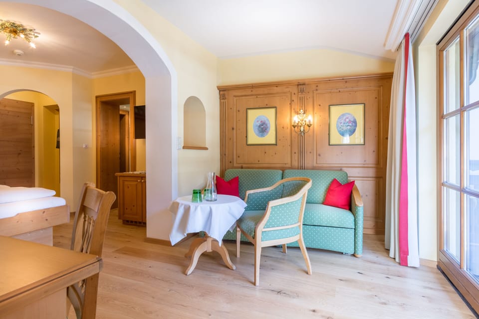 Junior Suite, Balcony, Mountain View | Living area | Flat-screen TV