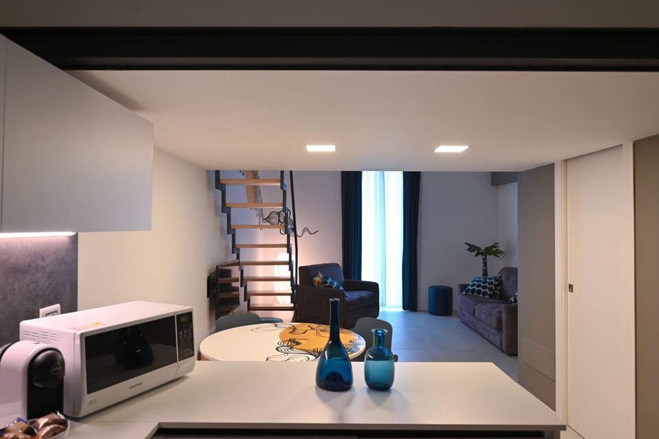 Deluxe Apartment, Balcony | Private kitchen | Fridge, microwave, stovetop, espresso maker