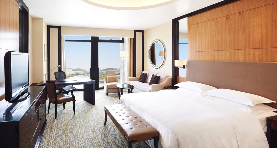 Premium bedding, down comforters, Select Comfort beds, minibar
