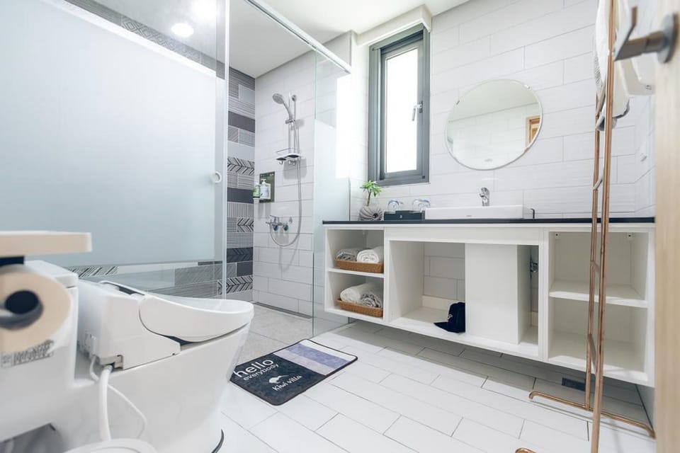 Luxury Quadruple Room, Balcony | Bathroom | Shower, rainfall showerhead, free toiletries, hair dryer
