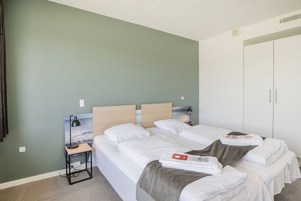 Comfort Quadruple Room | Premium bedding, pillowtop beds, individually decorated