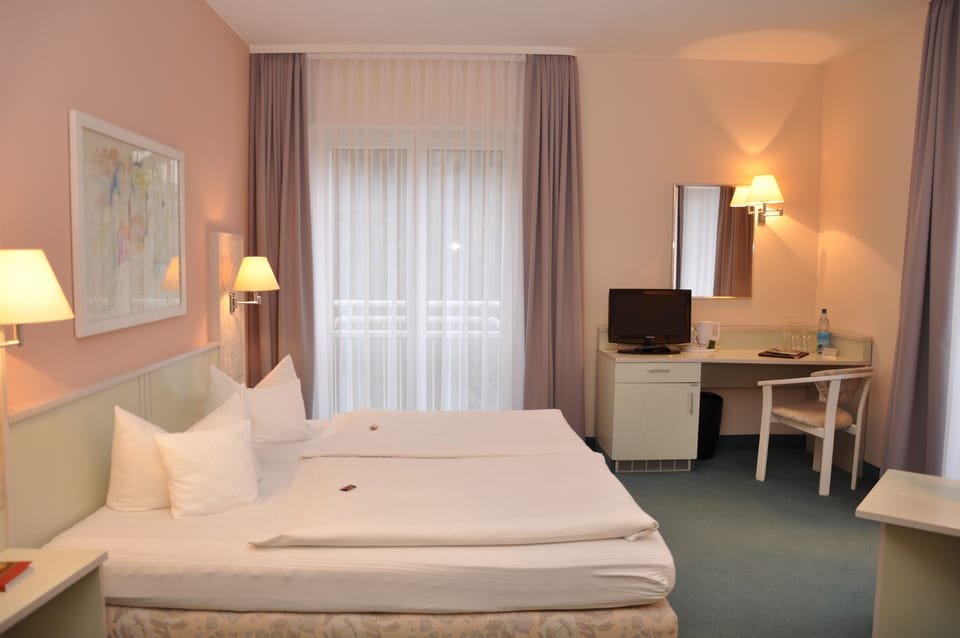 Standard Double Room | Minibar, desk, blackout drapes, bed sheets