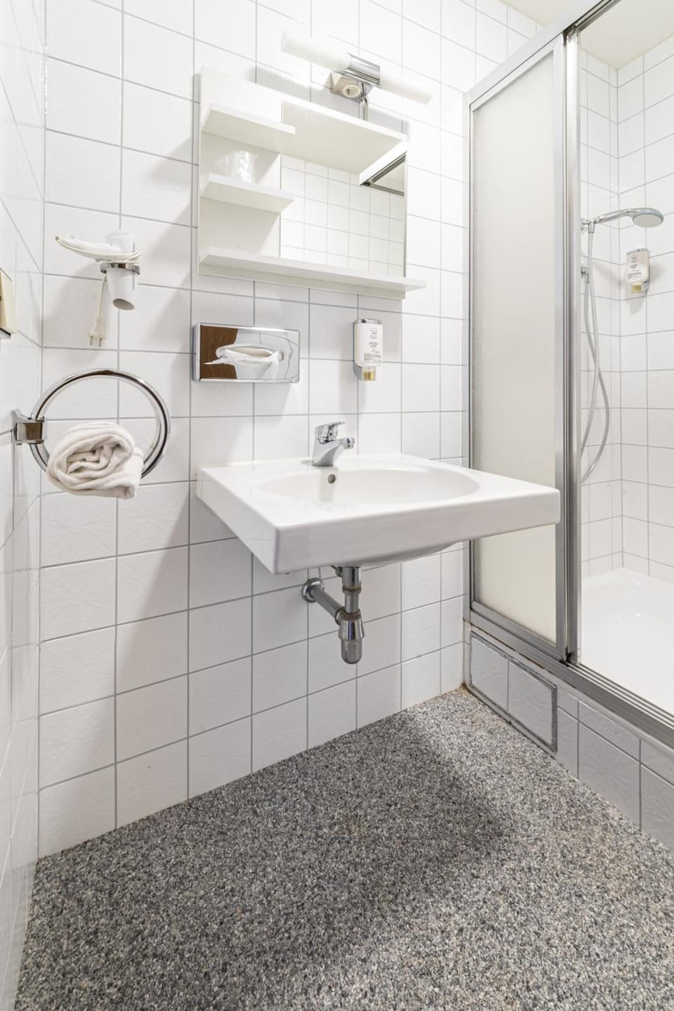 Hair dryer, towels, soap, shampoo