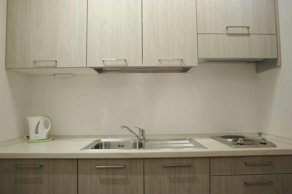 Family Room, 1 Queen Bed with Sofa bed | Private kitchen