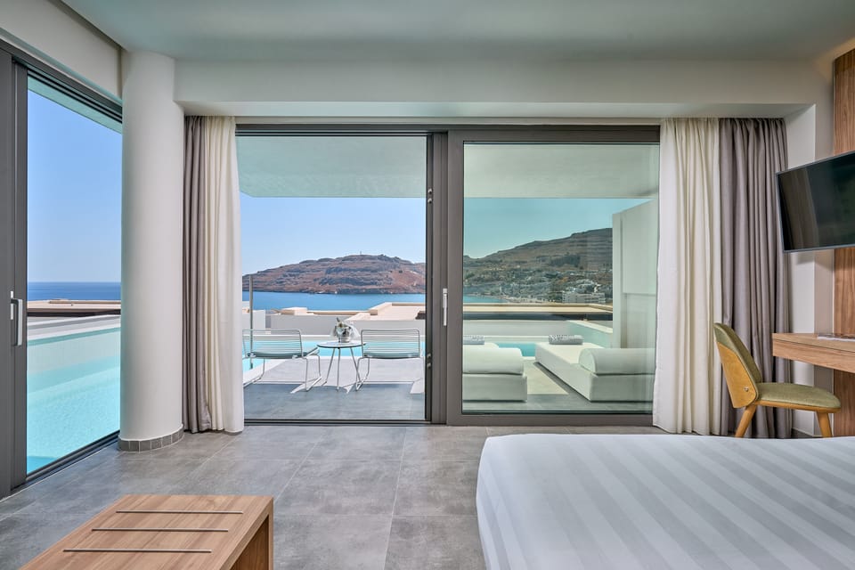 Deluxe Junior Suite, Sea View, Private Pool | Minibar, in-room safe, individually decorated, individually furnished