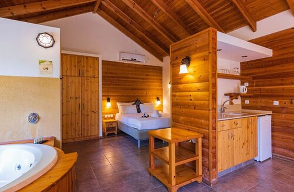 Basic Cabin, 1 Bedroom, Garden View, Garden Area | Private kitchenette | Fridge, electric kettle, cookware/dishes/utensils