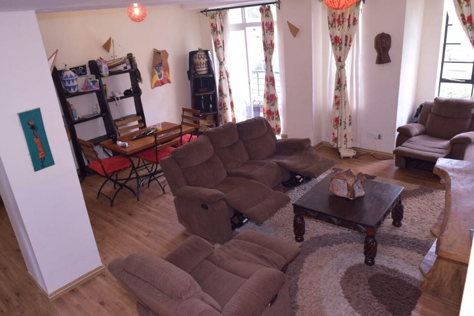 Apartment, 3 Bedrooms | Living room | Flat-screen TV