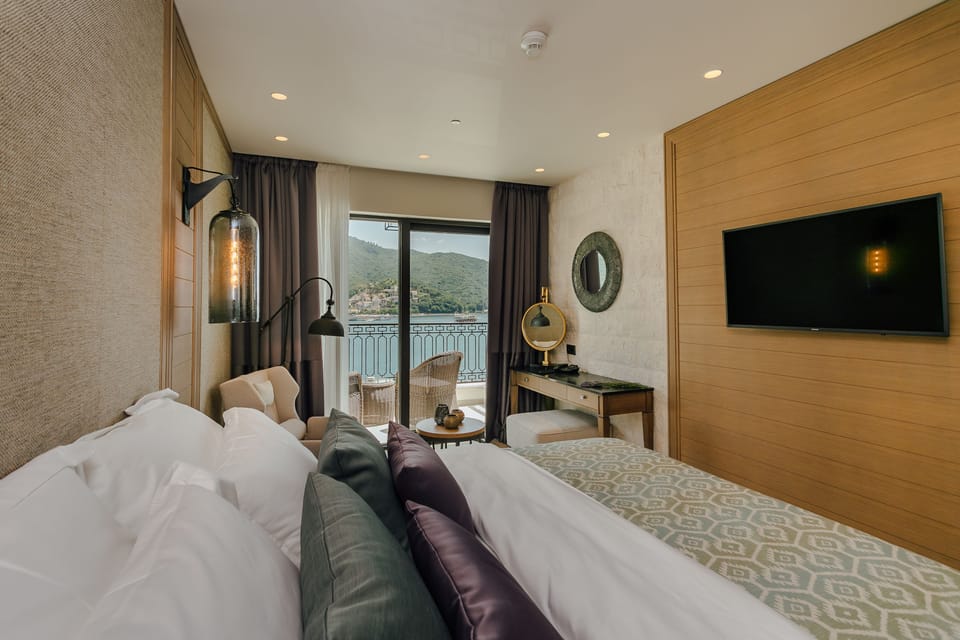 Deluxe Double Room, Balcony, Sea View | Frette Italian sheets, premium bedding, minibar, in-room safe