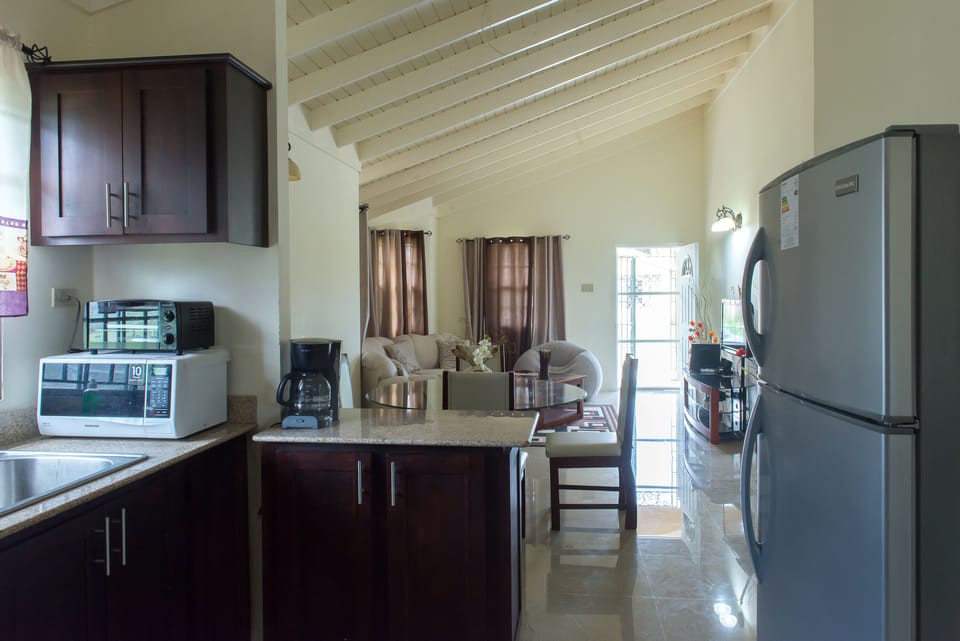 Family Villa, 2 Bedrooms | Private kitchen | Coffee/tea maker, full-size fridge, microwave, oven