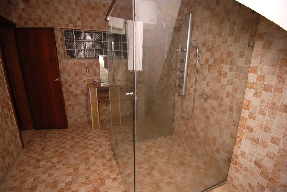 Presidential Suite, 1 Double Bed | Bathroom | Shower, rainfall showerhead, free toiletries, towels