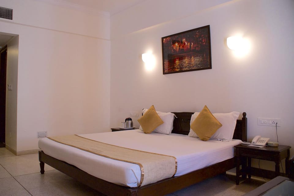 Desk, blackout drapes, iron/ironing board, rollaway beds