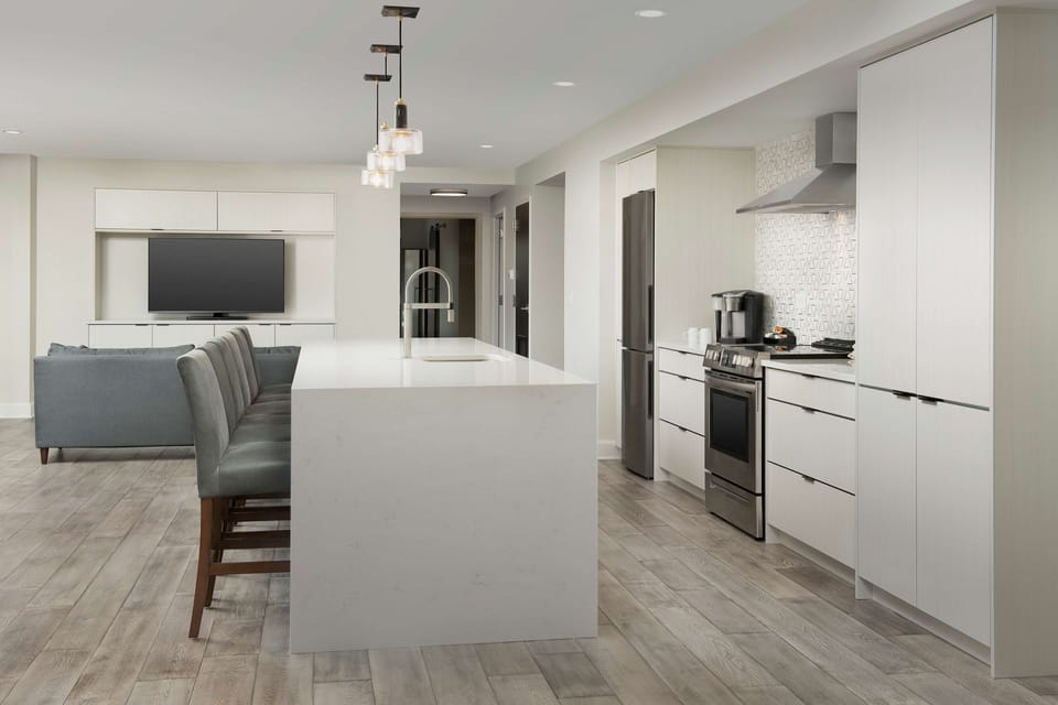 Suite, 2 Bedrooms | Private kitchen | Fridge, microwave, dishwasher, coffee/tea maker