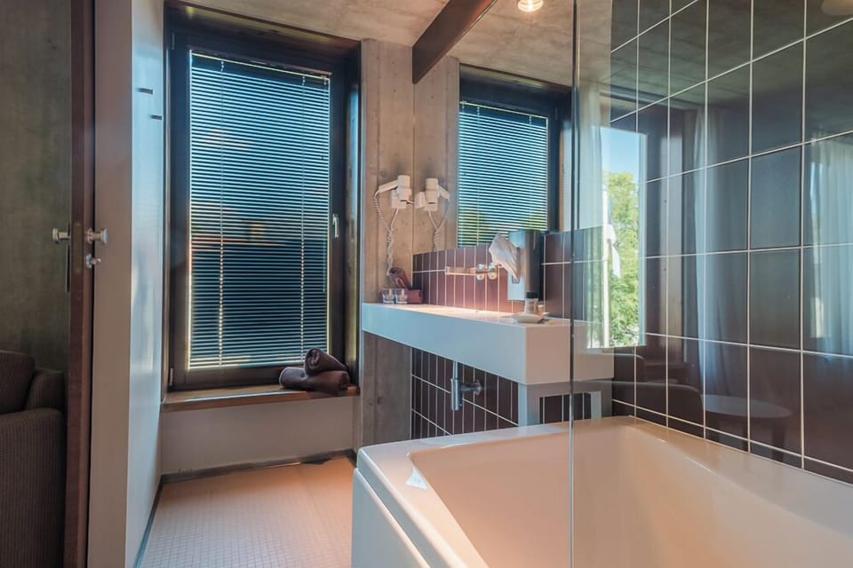 Junior Suite, Bathtub (Spa Access Included) | Bathroom amenities | Free toiletries, hair dryer, bathrobes, slippers