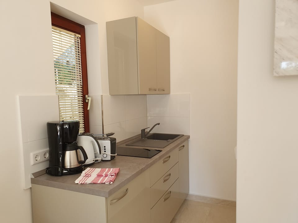 Studio, Balcony, Partial Sea View | Private kitchen | Fridge, coffee/tea maker