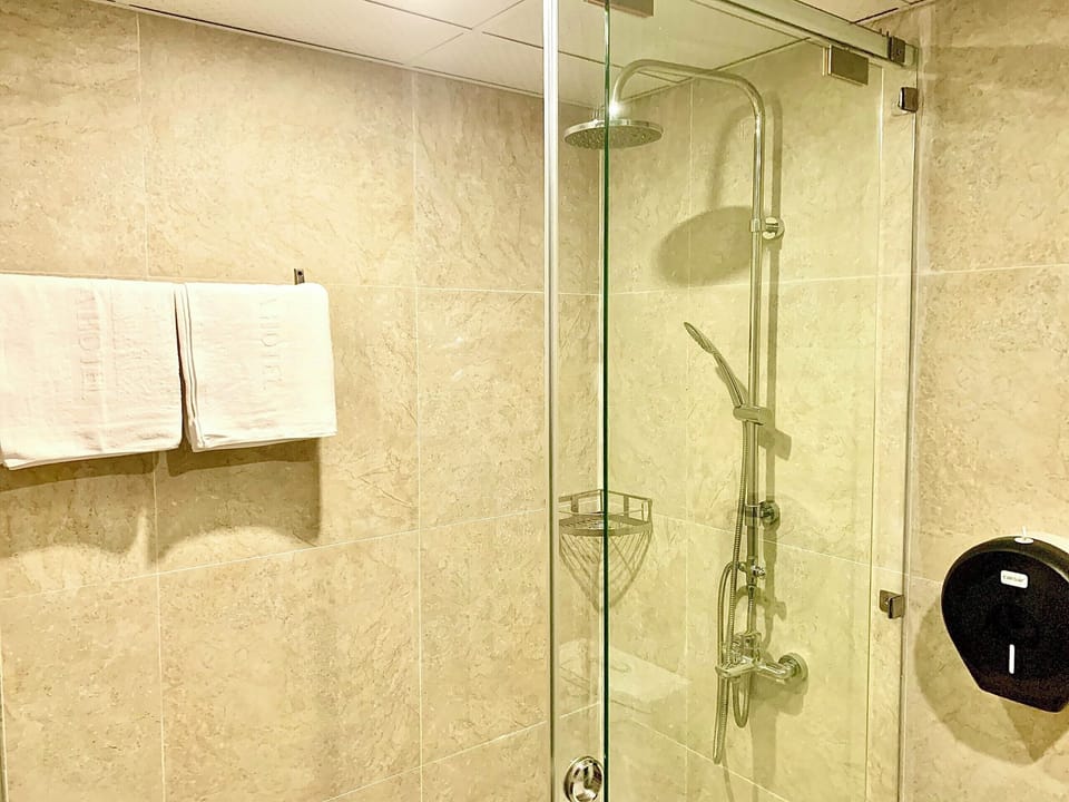 Family Quadruple Room, 1 Bedroom, Pool View | Minibar, desk, blackout drapes, soundproofing