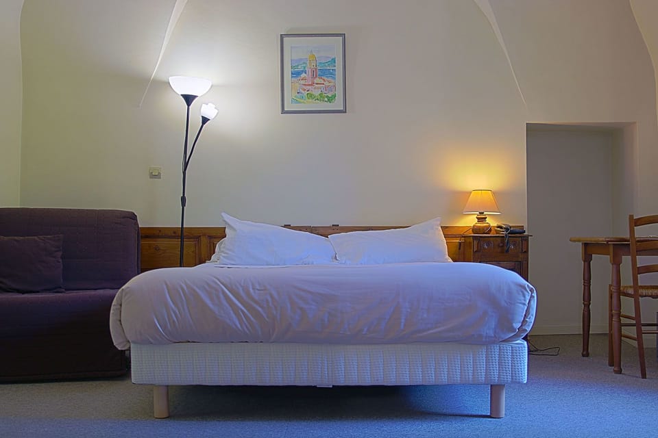 Desk, blackout drapes, soundproofing, iron/ironing board