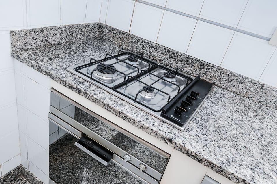 Apartment, 1 Bedroom | Private kitchen | Full-size fridge, microwave, oven, stovetop