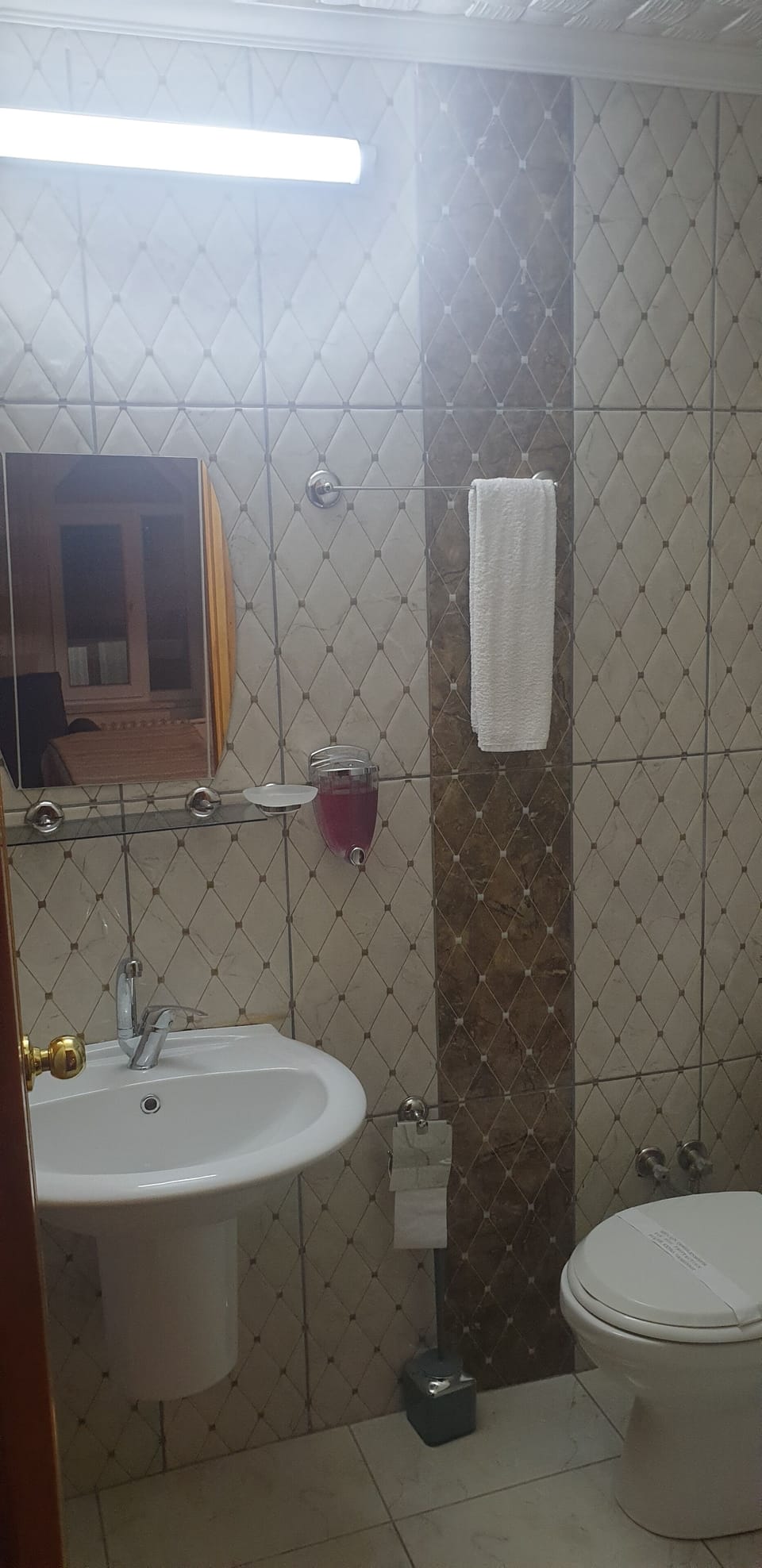 Shower, free toiletries, hair dryer, slippers