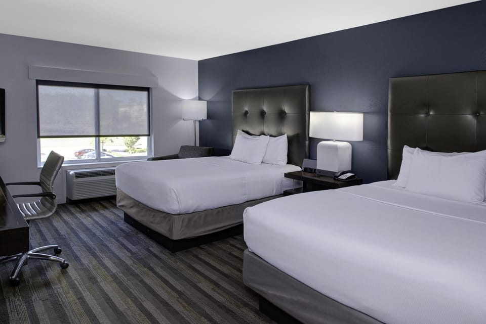Premium bedding, pillowtop beds, desk, blackout drapes