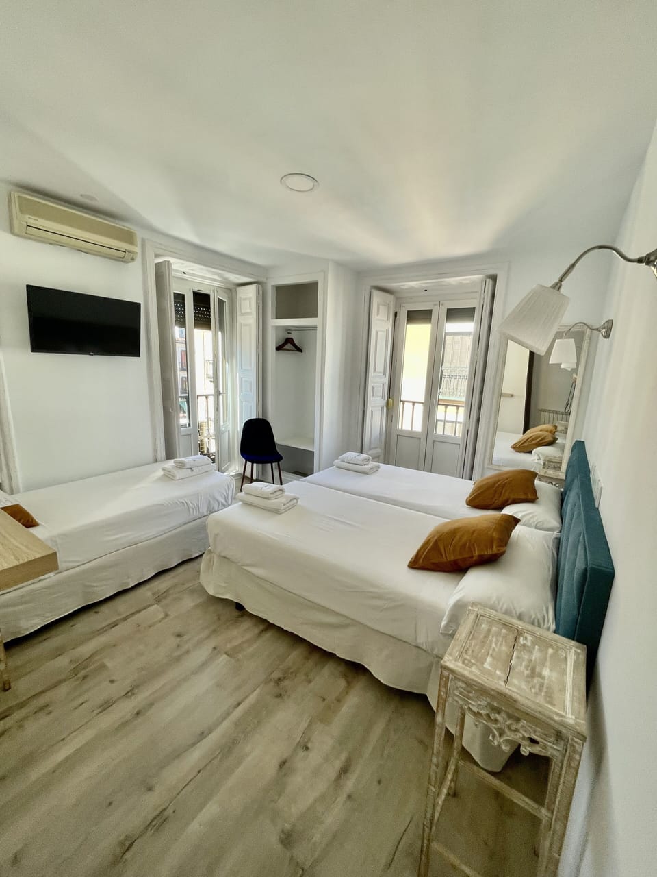 Triple Room | Desk, blackout drapes, iron/ironing board (on request), WiFi (free)