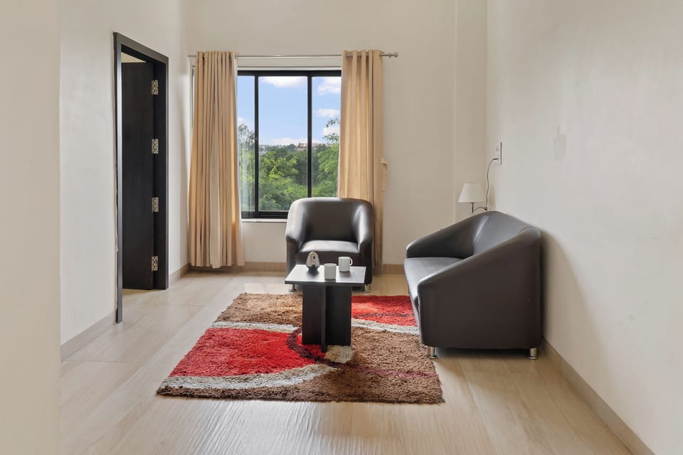 Hazel Suite | Living area | 32-inch LED TV with satellite channels