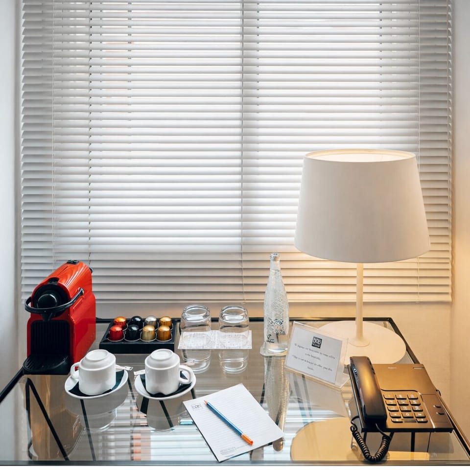 Premium bedding, down comforters, minibar, in-room safe
