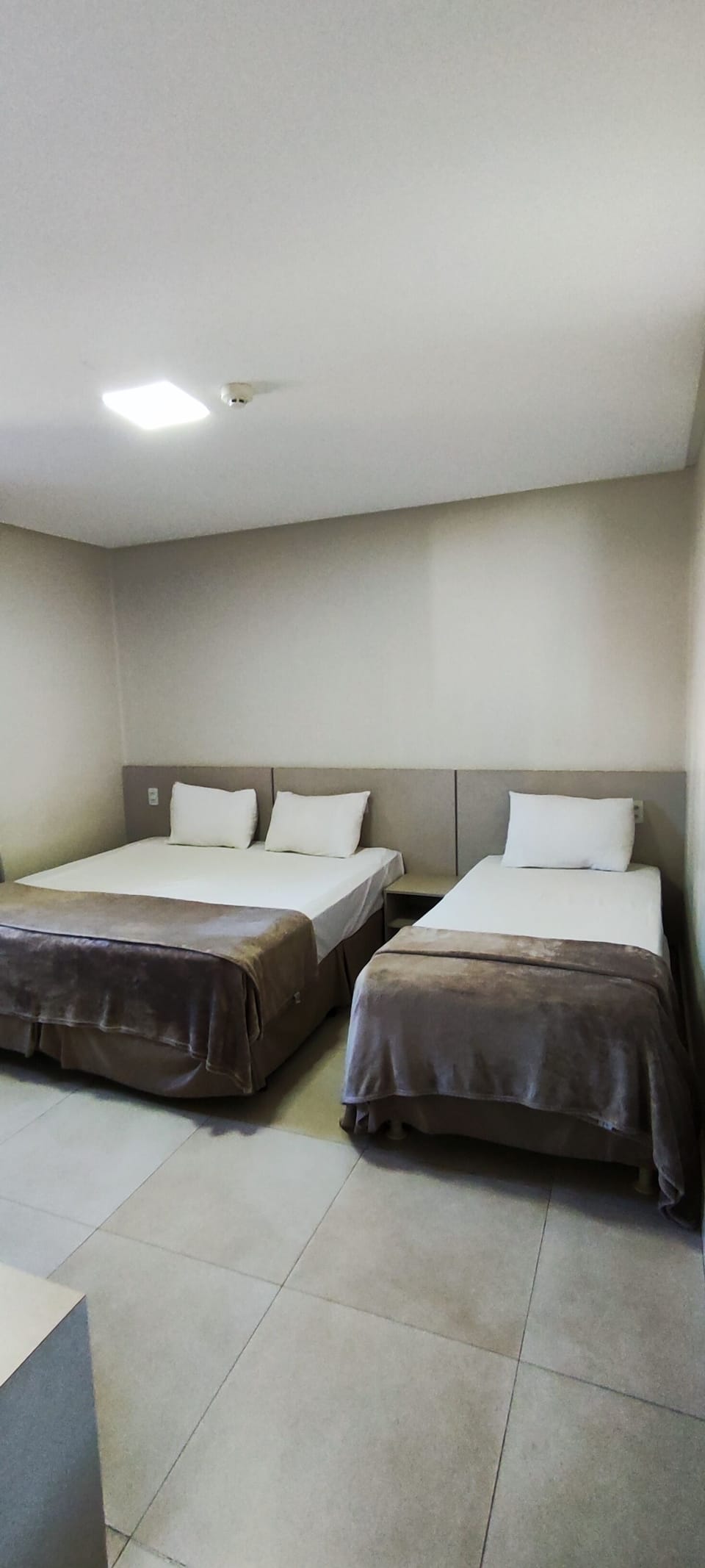 Family Triple Room | Desk, laptop workspace, blackout drapes, free WiFi
