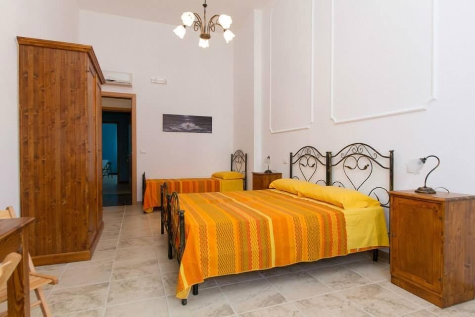 Triple Room, Multiple Beds | Cribs (free), WiFi (free), bed sheets