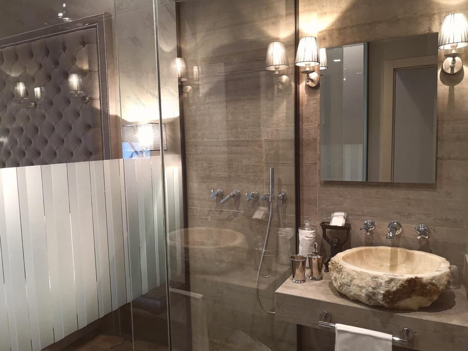 Shower, free toiletries, hair dryer, slippers