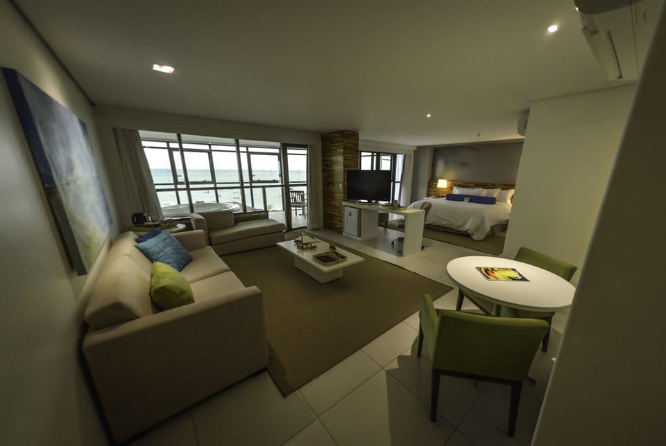 Suite, 1 King Bed, Balcony, Oceanfront | Minibar, in-room safe, individually decorated, individually furnished