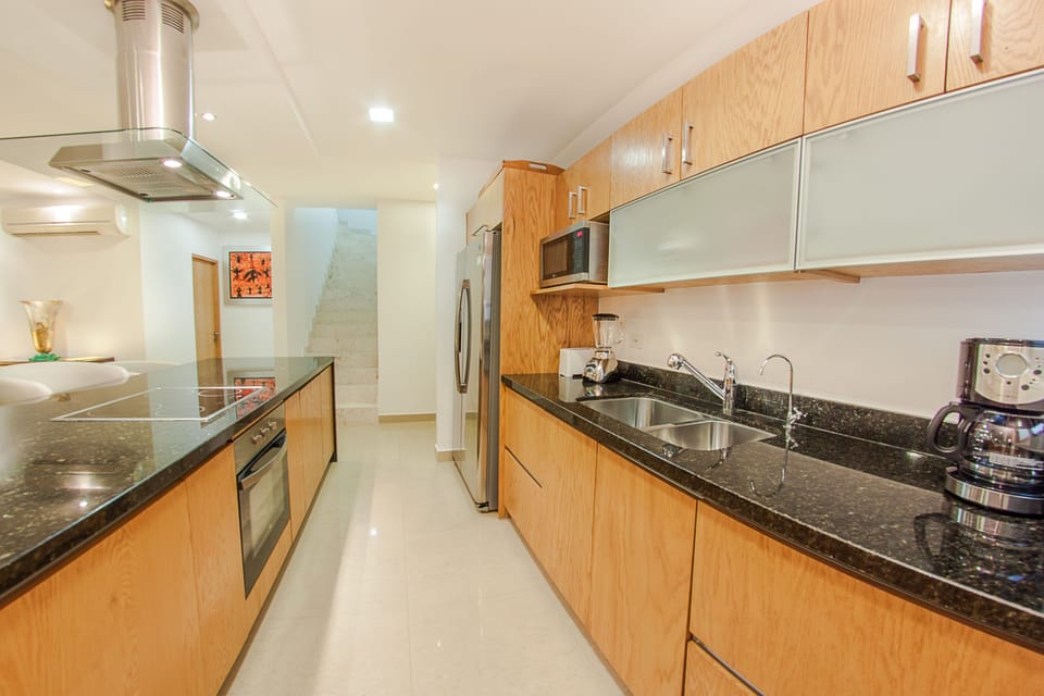 Apartment, 2 Bedrooms | Private kitchen | Fridge, microwave, stovetop, cookware/dishes/utensils