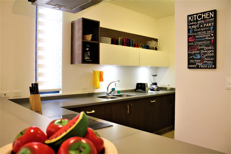 Apartment, 2 Bedrooms | Private kitchen | Fridge, microwave, stovetop, cookware/dishes/utensils