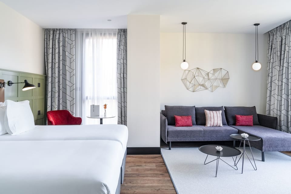 Premium bedding, down comforters, minibar, in-room safe