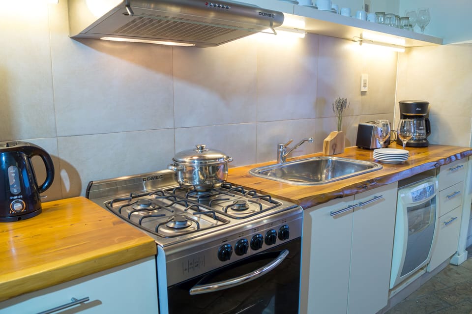 Deluxe Room, Multiple Beds, Garden View (Mountain Residence 3 Bedrooms 2 Baths) | Private kitchen | Microwave, stovetop, coffee/tea maker, toaster