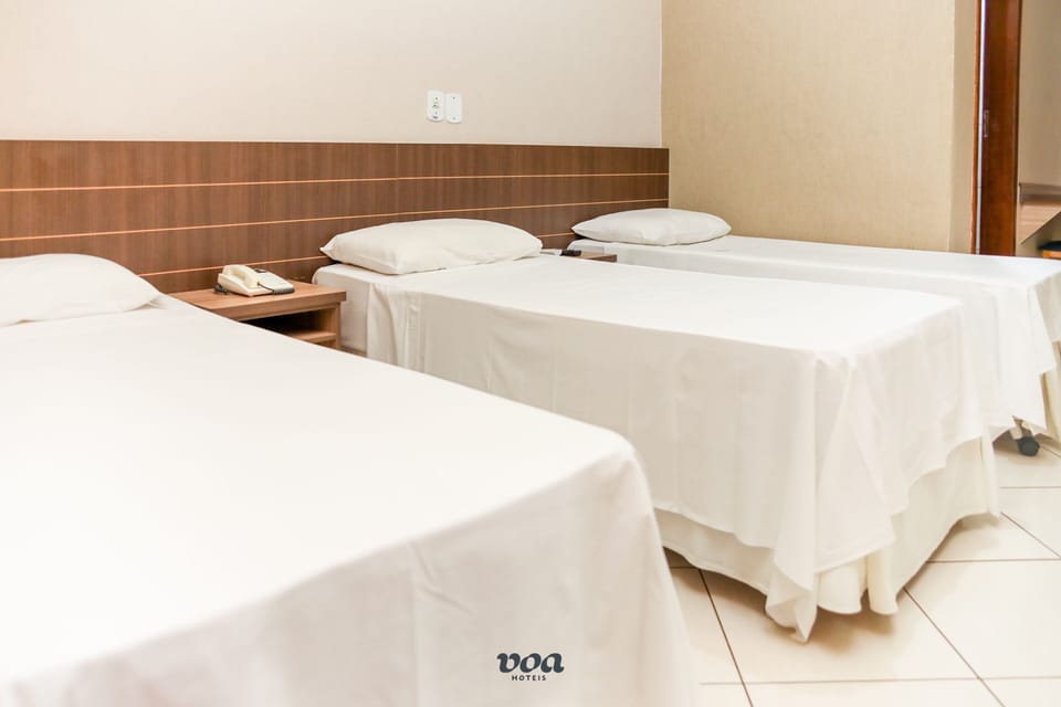 Standard Triple Room | Minibar, desk, free WiFi, bed sheets