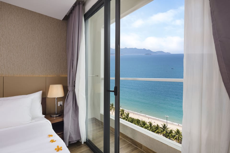 Family Room, Balcony, Sea View | Minibar, in-room safe, desk, blackout drapes