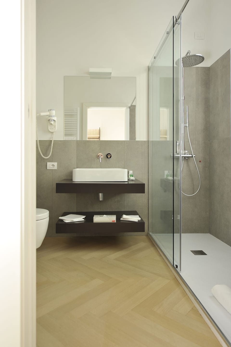 Shower, free toiletries, hair dryer, slippers