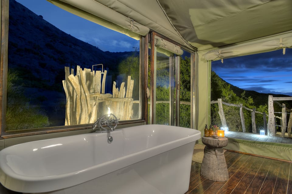 Separate tub and shower, deep soaking tub, designer toiletries